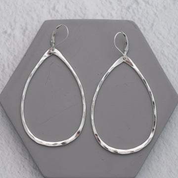 Big Sterling silver teardrop earrings with leverback ear wires.  Statement earrings with hand hammered silver and nickel free lever back earwires.