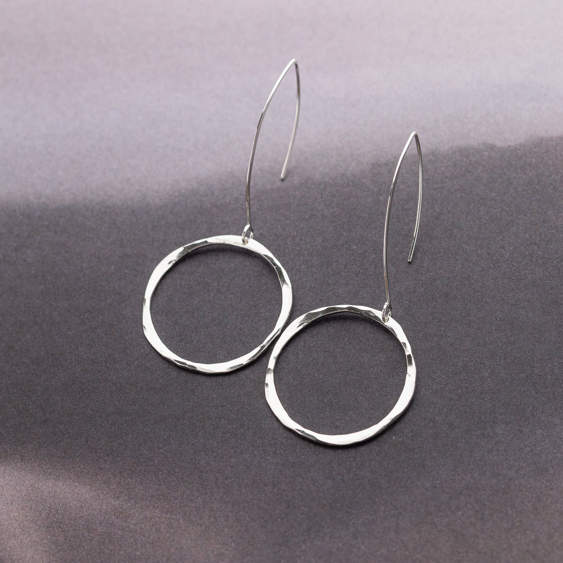 Handmade hammered silver dangle hoop earrings