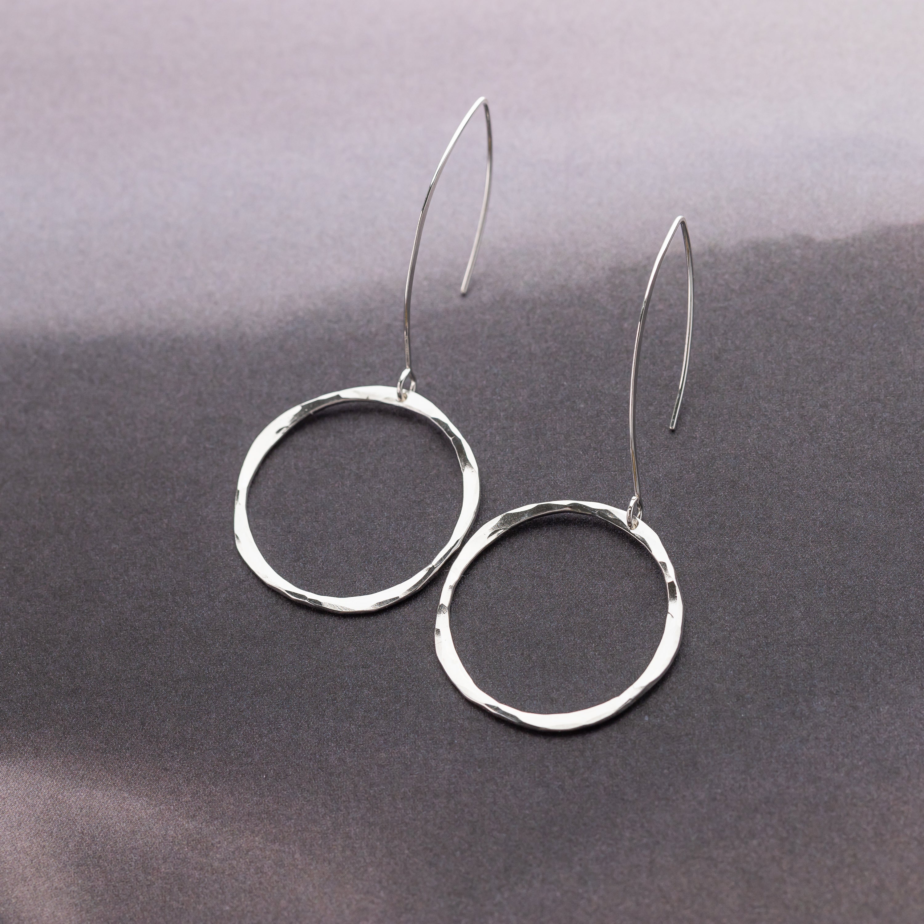 Handmade hammered silver dangle hoop earrings