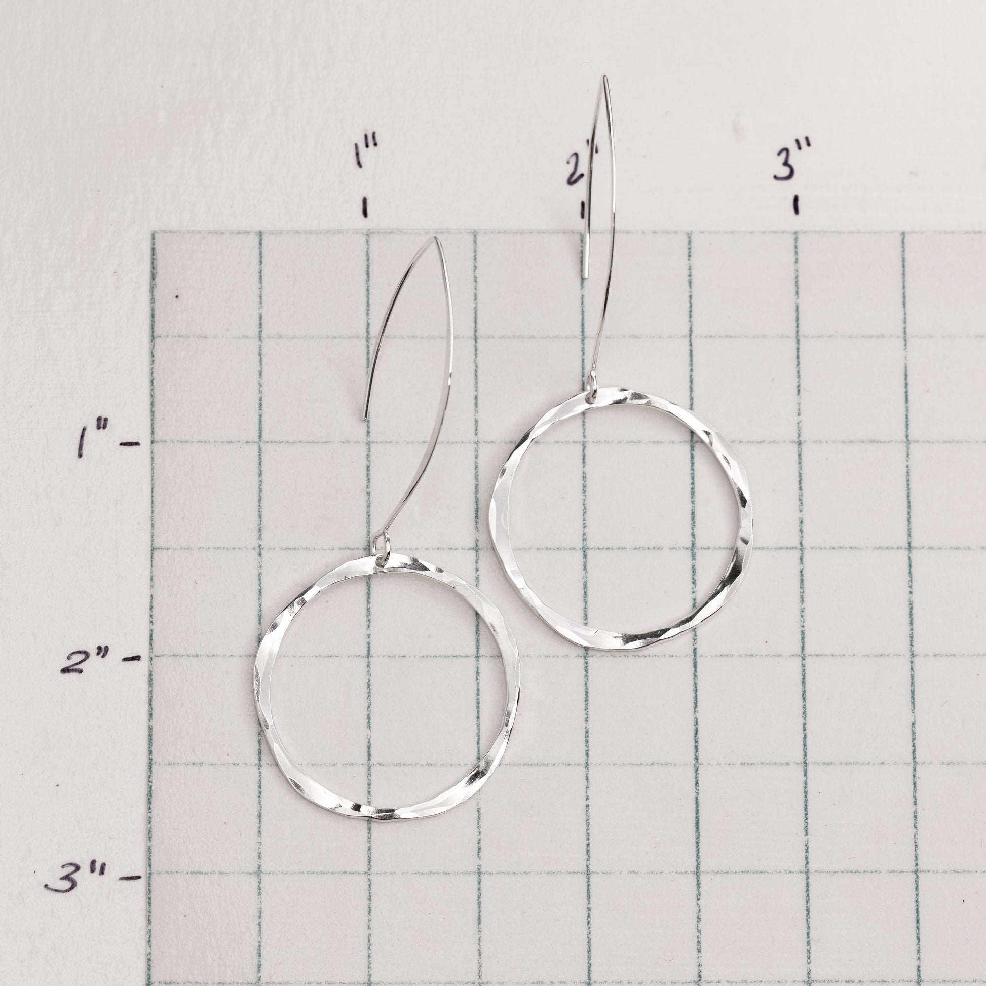 Artisanal sterling silver earrings with long wire hooks