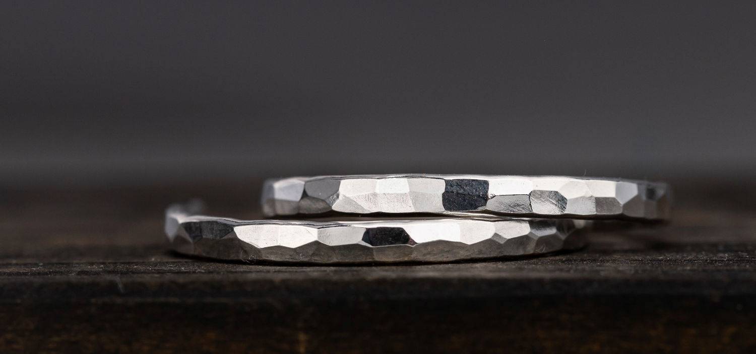 hand hammered sterling silver hoop earrings and shown close up to highlight the beautiful texture.  These are polished to a high shine and sparkle beautifully.  Great hoop earrings for everyday