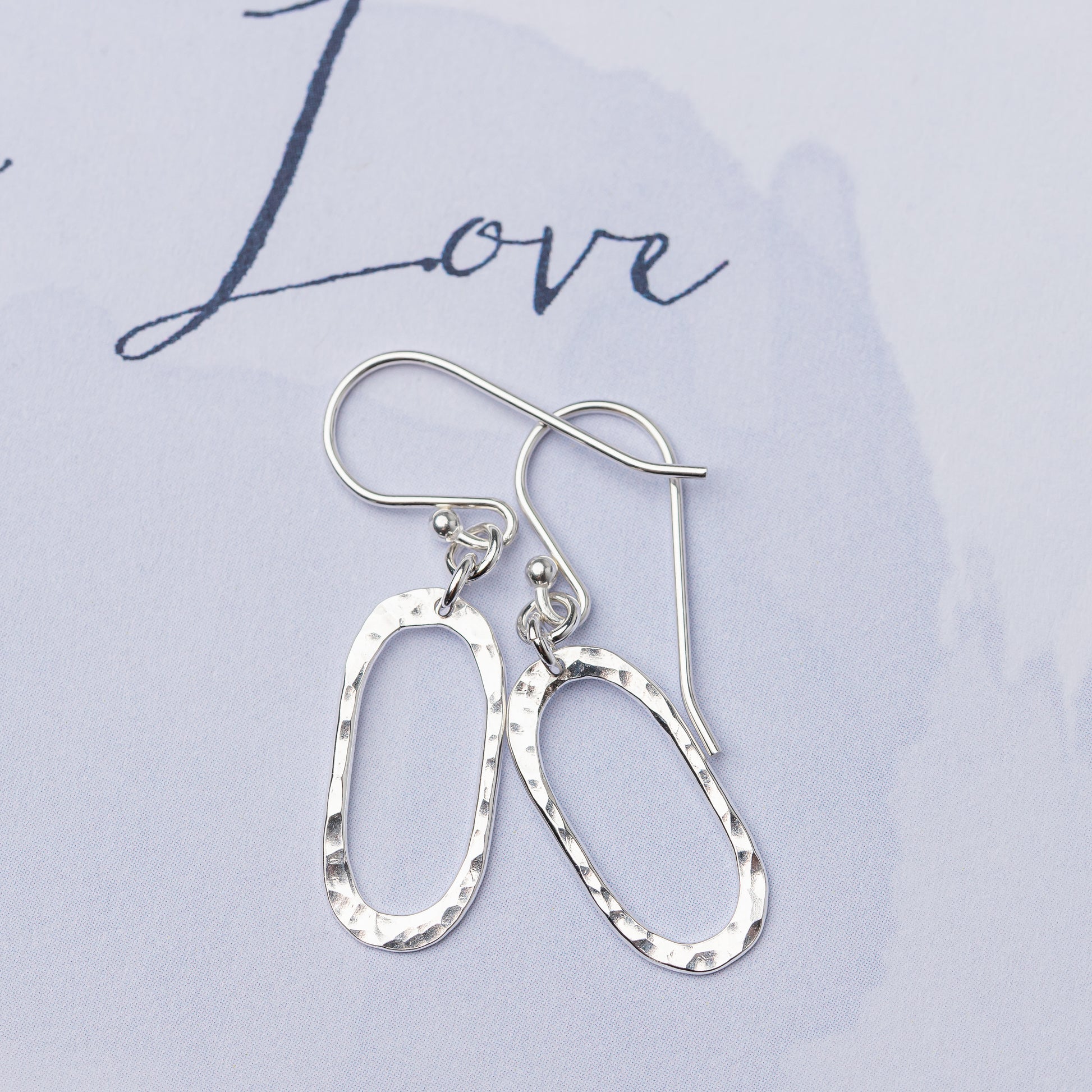 Ultra-lightweight sterling silver earrings with hammered texture