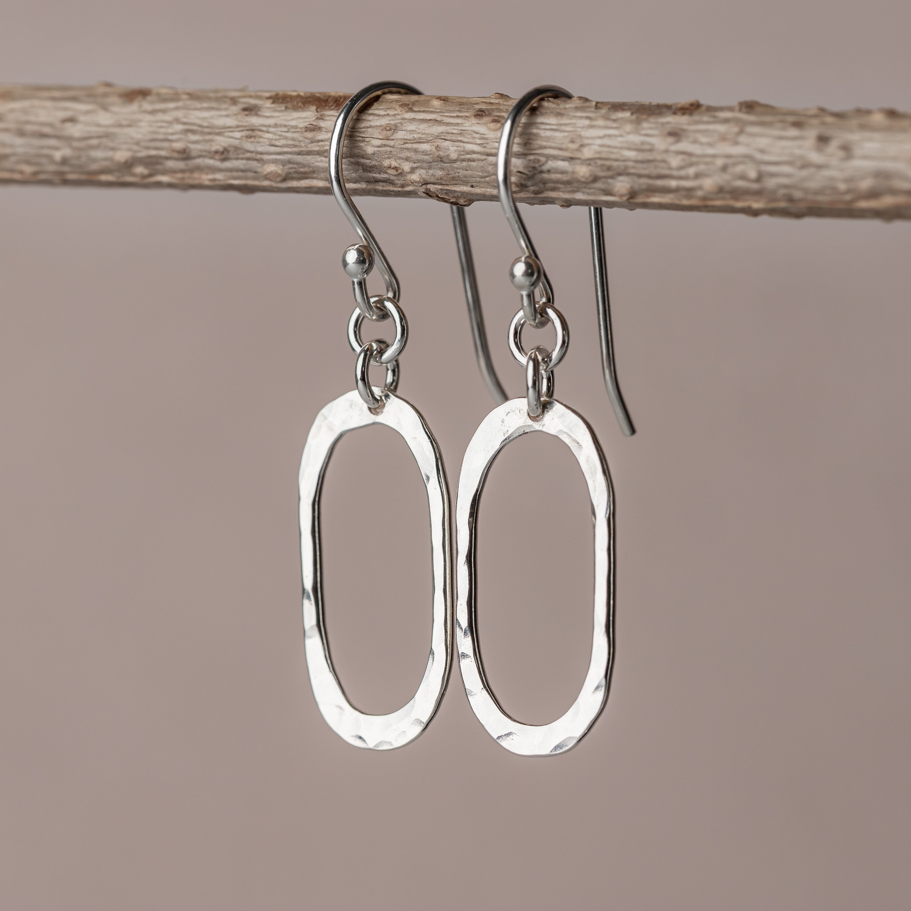 High polish hammered silver oval earrings