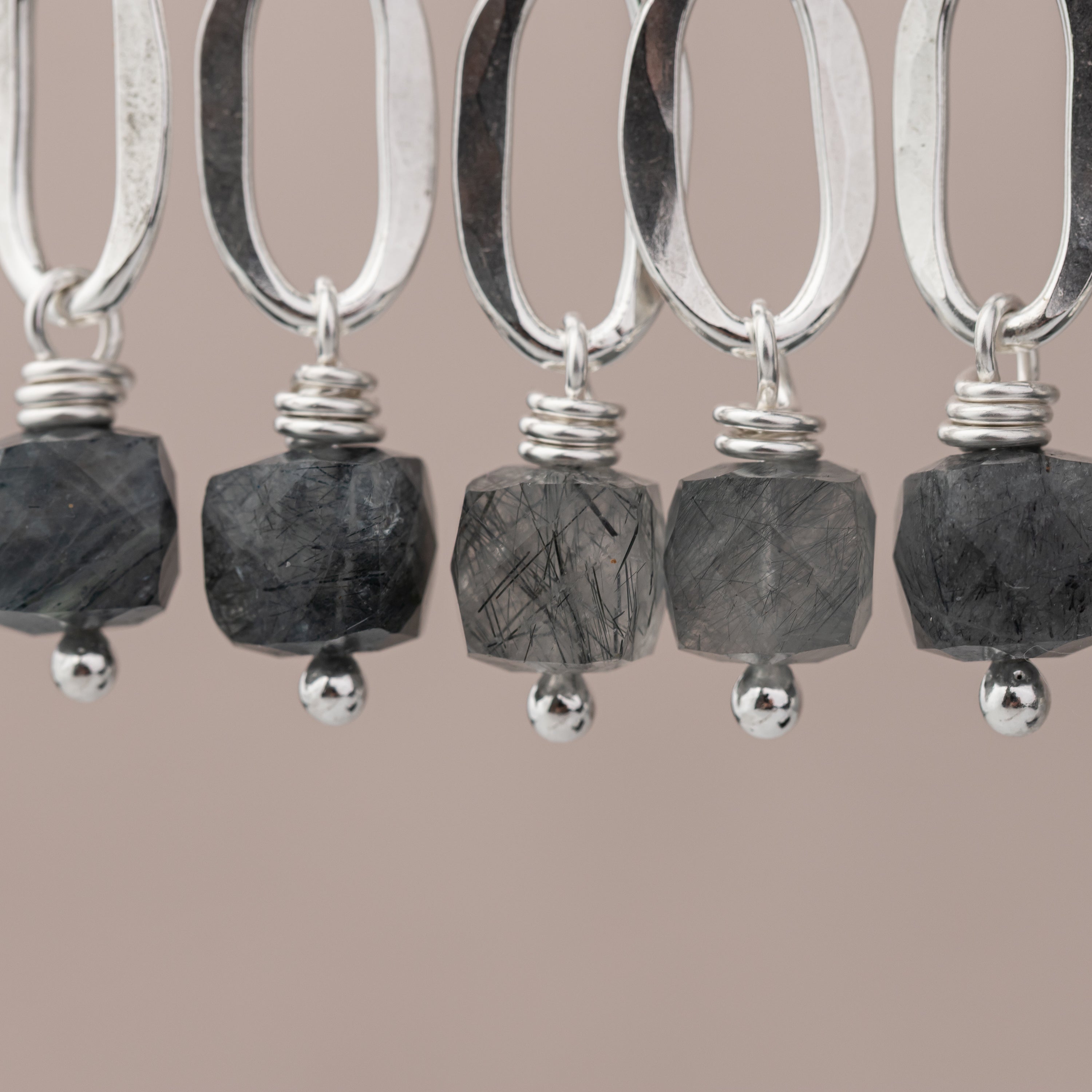 Close up of the gemstones on these unique handmade quartz earrings