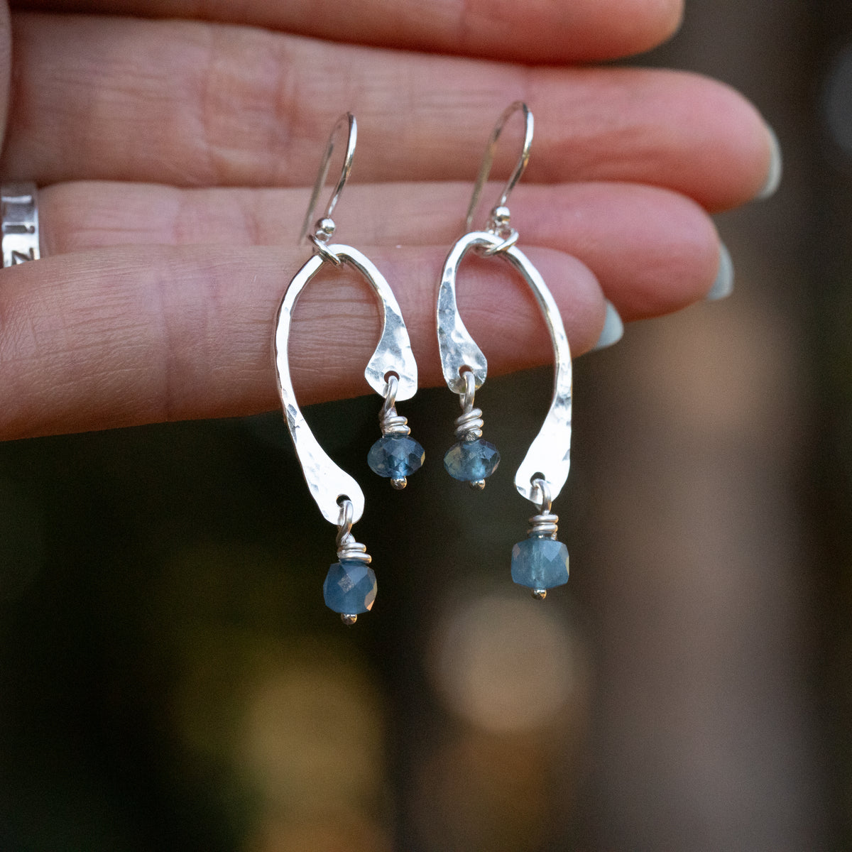 handmade aquamarine and sterling silver hand hammered earrings with natural gemstones.