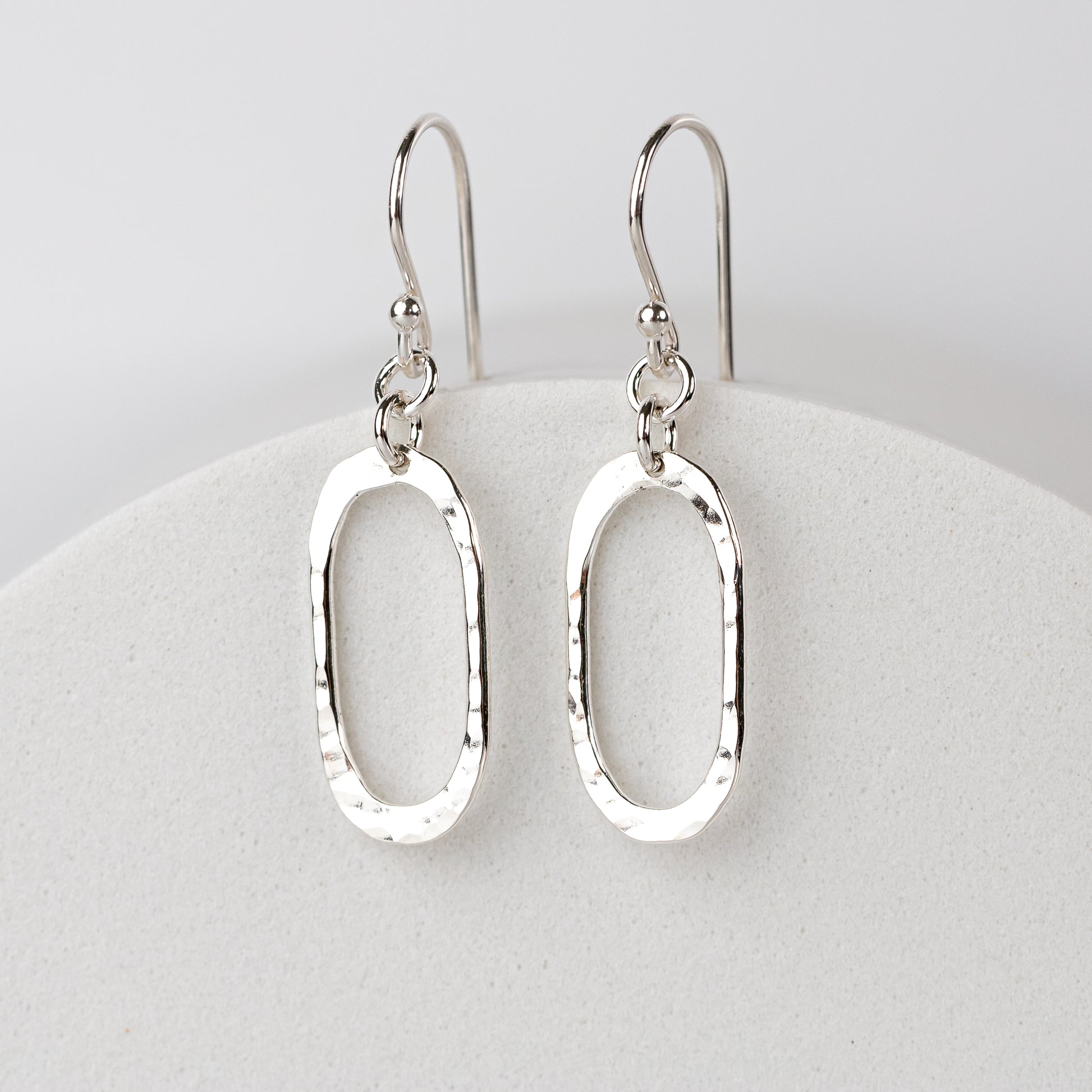 Handmade silver oval dangle earrings in Argentium sterling