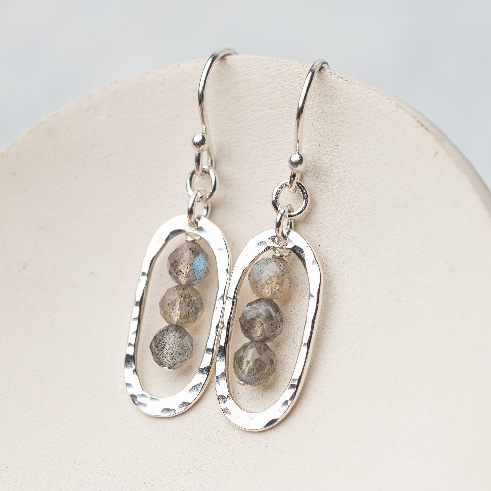 Lightweight silver oval drop earrings with faceted labradorite