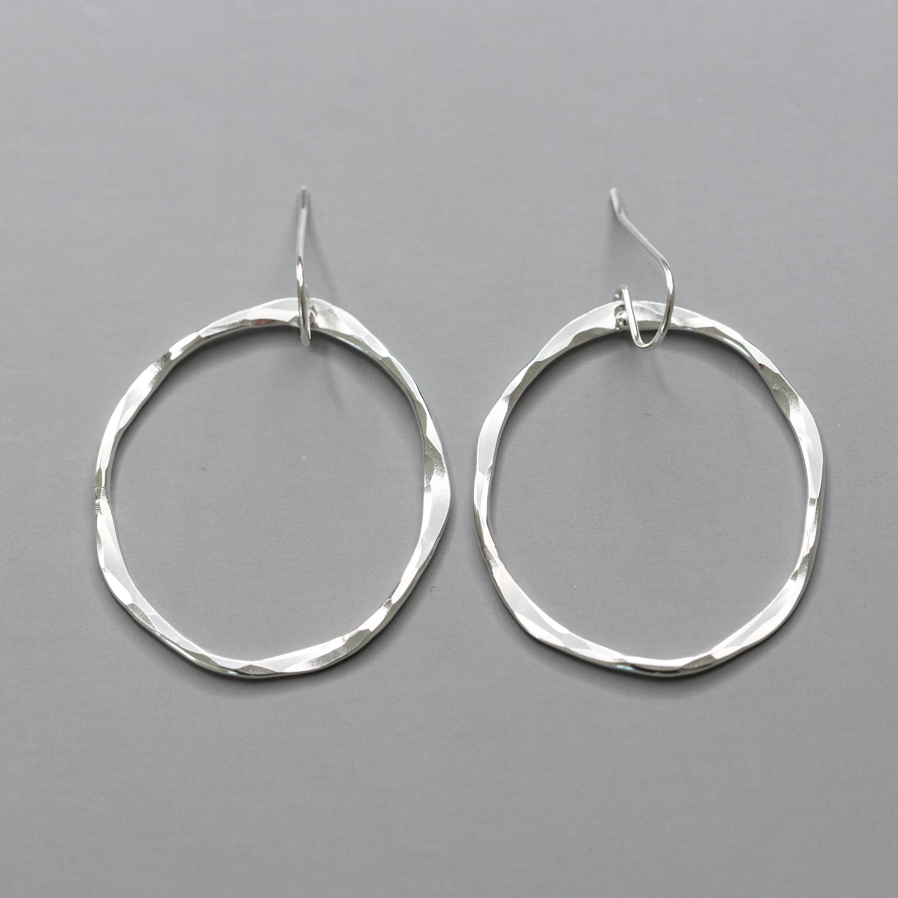 handmade sterling silver dangle drop earrings with hammered texture