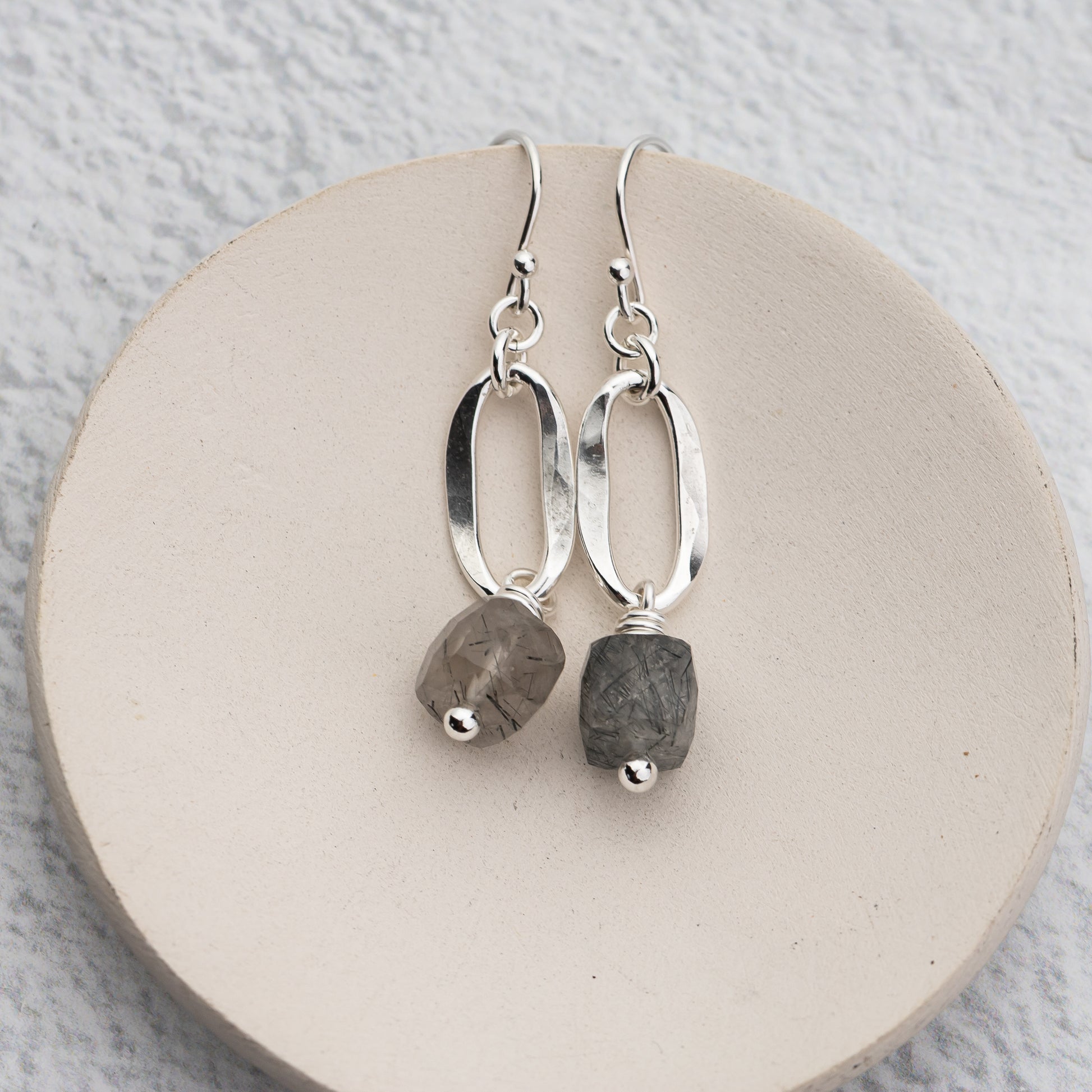 unique handmade silver earrings with hammered ovals and tourmalized quartz gemstones