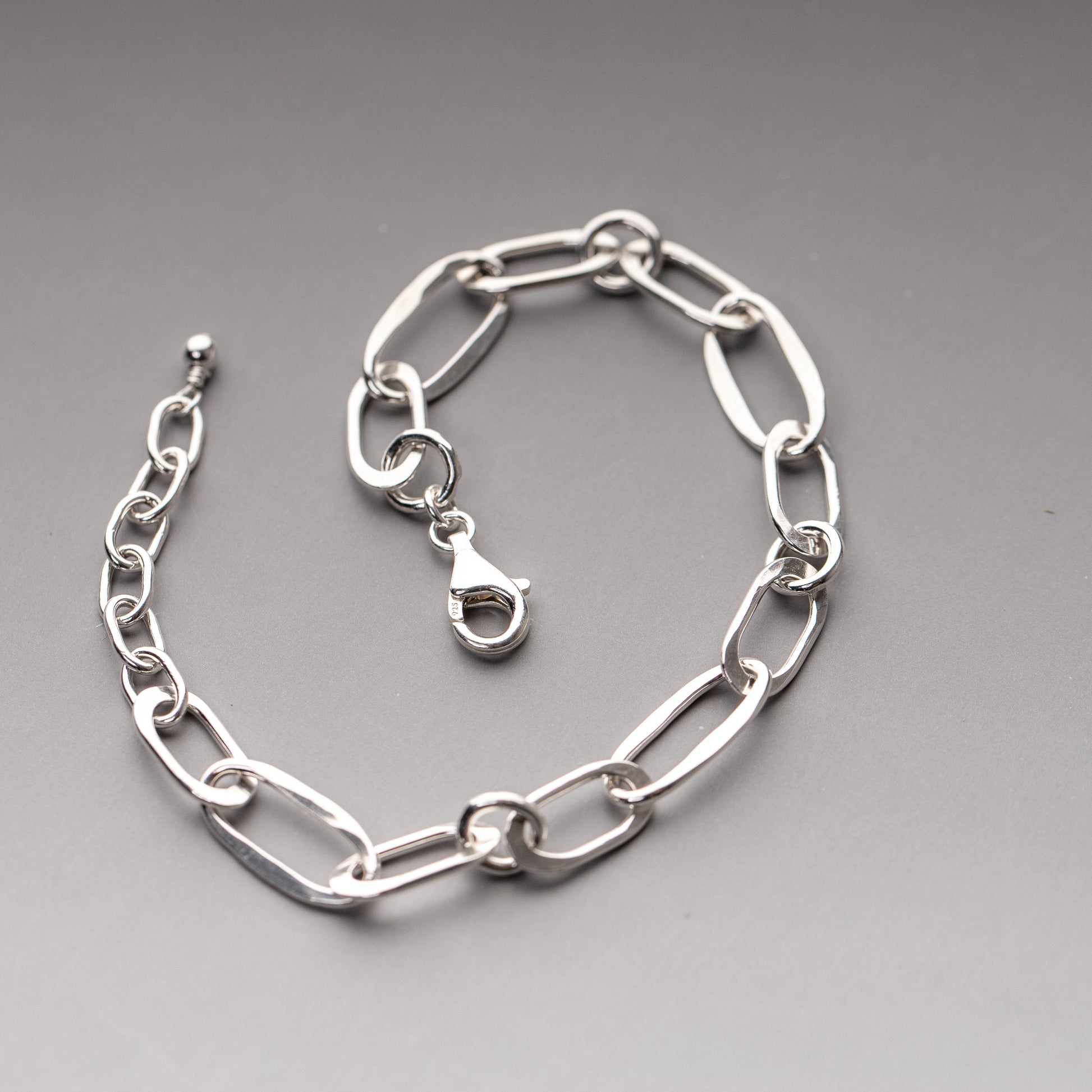 Hand-hammered silver bracelet with unique link pattern