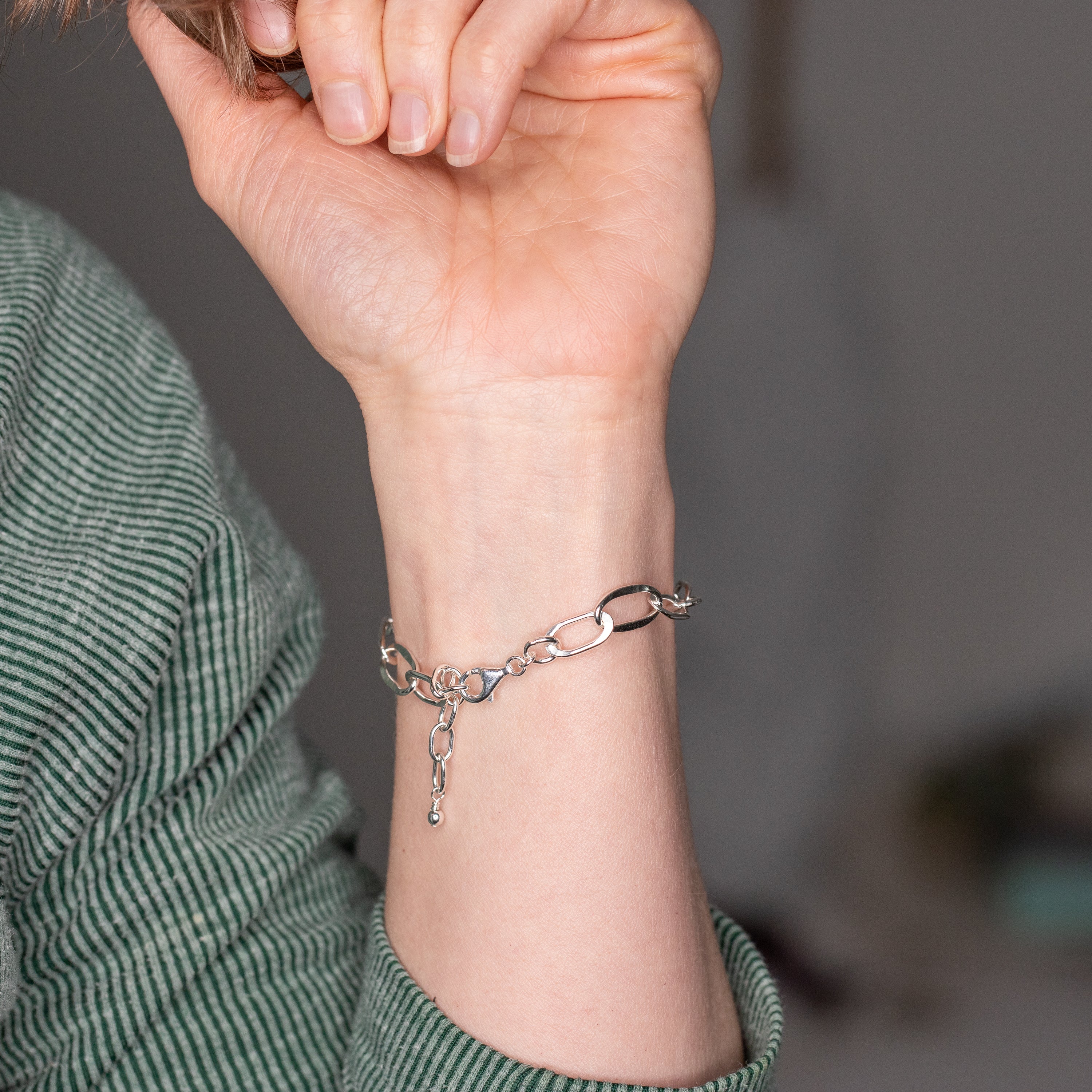 Lightweight handmade silver bracelet worn on wrist