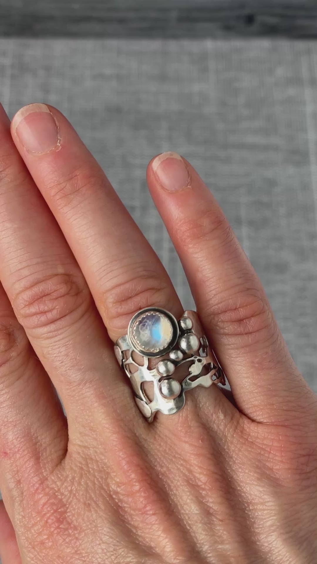 Load video: Rainbow Moonstone and Sculpted Silver Ring