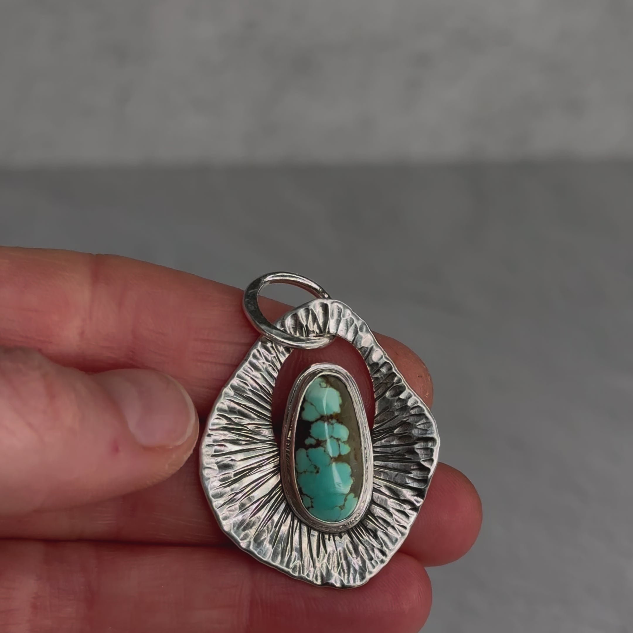 Load video: Abstract Hammered Turquoise Pendant